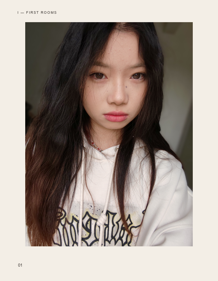 Direct close portrait in a white hoodie