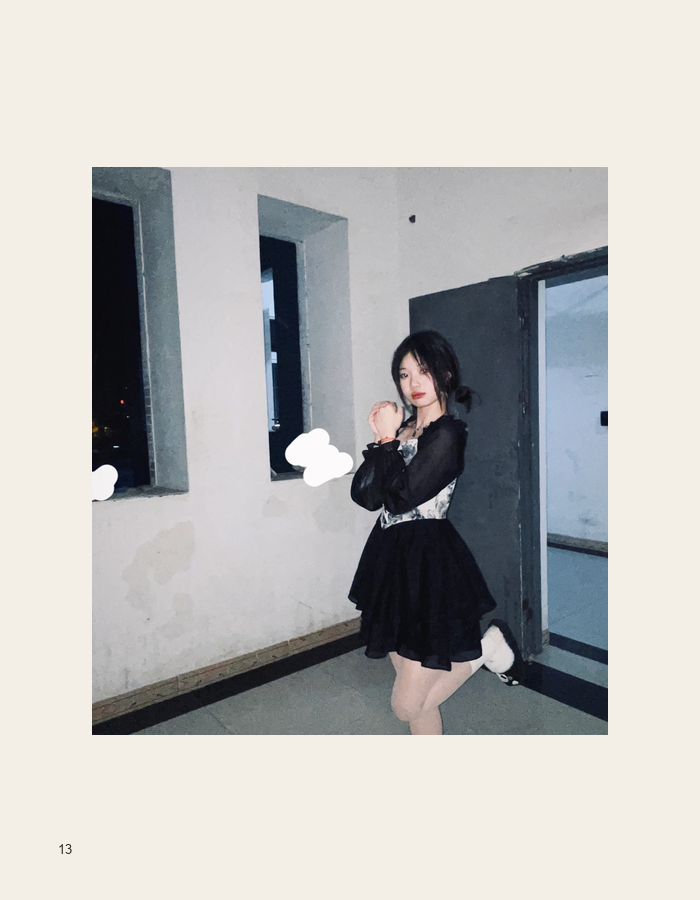 Black dress portrait framed by stark architecture