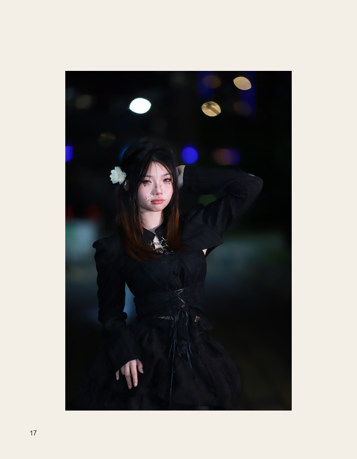 Dark outdoor portrait with colored lights