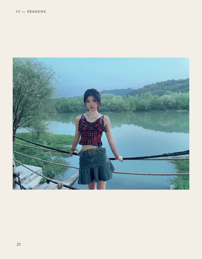 Red dress portrait beside a lake