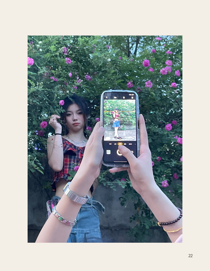 Framed portrait amid pink blossoms